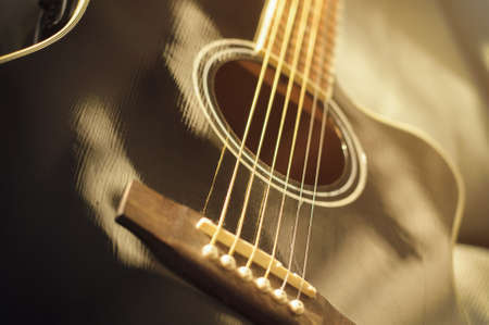 black acoustic guitar