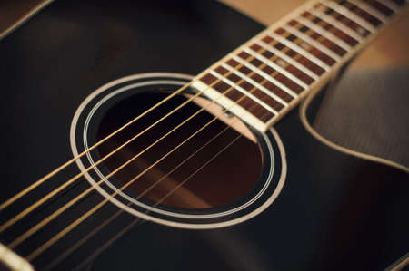 black acoustic guitarの写真素材
