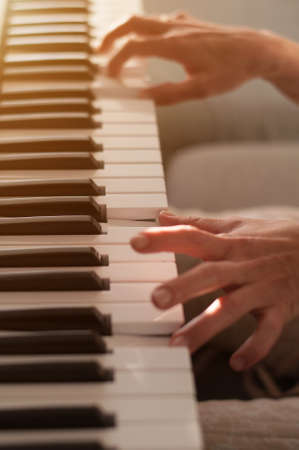 hands on piano