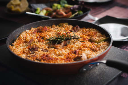 a small pan of paella Valenciana, made at homeの写真素材