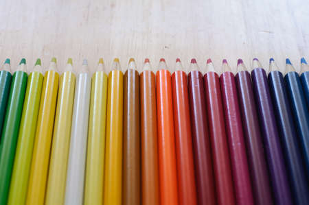 group of drawing color pencils on wooden backgroundの写真素材