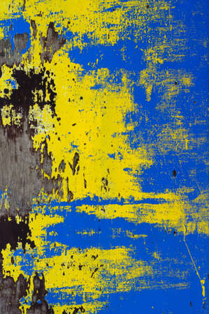 the texture of peeling paint is blue-yellowの写真素材