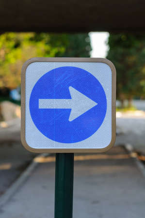 Traffic sign: mandatory sense turn to the rightの写真素材