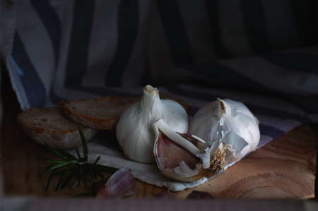 garlic black bread rosemary on a towelの写真素材