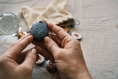 rune stone good luck and riches talisman with runescriptの写真素材