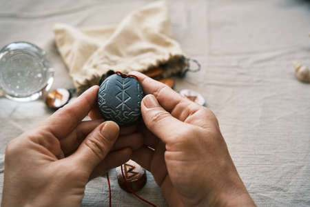 rune stone good luck and riches talisman with runescriptの写真素材
