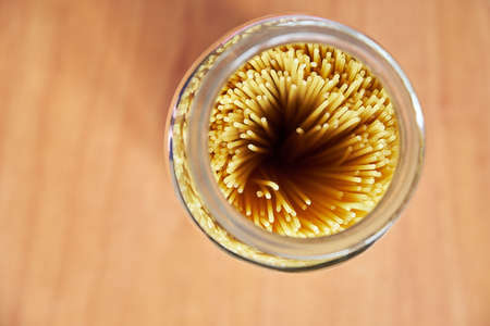 spaghetti in a glass jar close-up