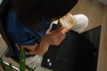 young happy business woman working at a laptopの写真素材