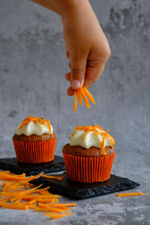 cakes topped with fresh carrots
