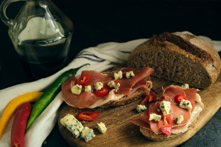 rye bread with slices of jamon and cheese