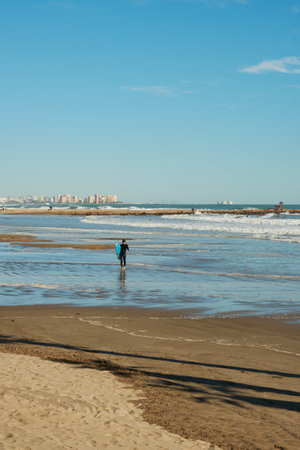 lonely surfer with a boardのeditorial素材