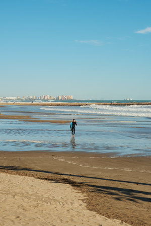 lonely surfer with a boardのeditorial素材