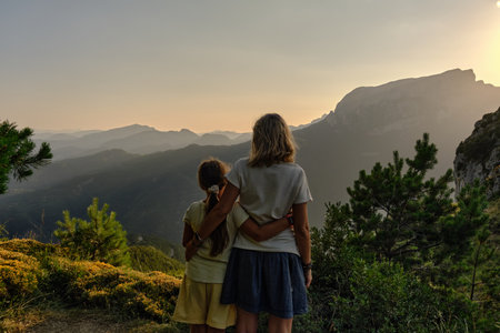 mother and daughter look at the mountainsのeditorial素材