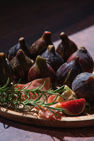 still life figs on a wooden plateの写真素材