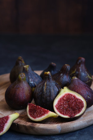 still life figs on a wooden plateの写真素材