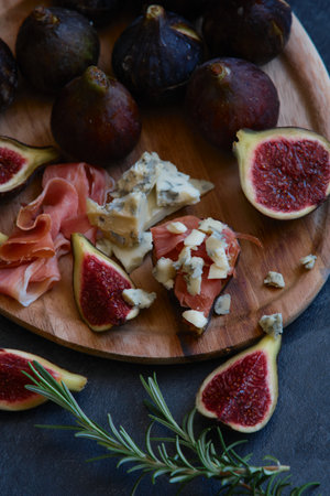 figs cheese with mold and jamonの写真素材