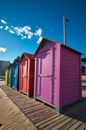 Brightly painted summer beach change roomsの写真素材
