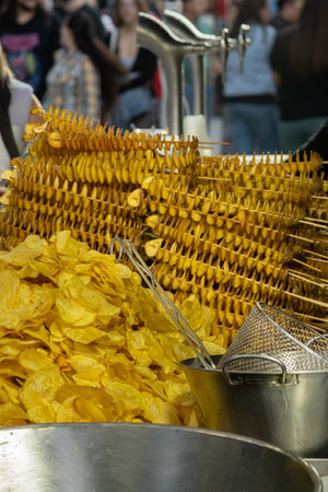 fried potatoes in the form of chipsの写真素材