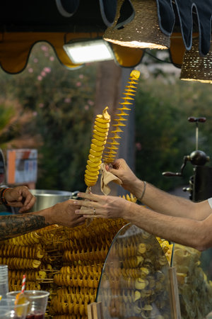 fried potatoes in the form of chipsの写真素材