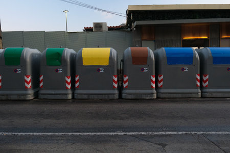 On the street of the city garbage cans for sorted wasteの写真素材