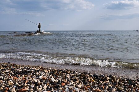 a lone fishermanの写真素材