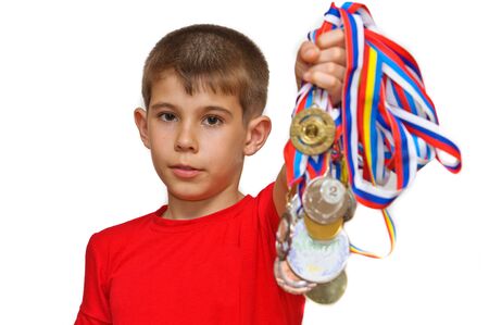 Boy-athlete with medalsの写真素材