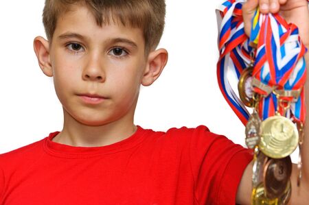 Boy-athlete with medalsの写真素材