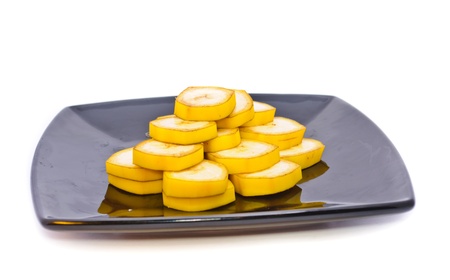 Banana on a plate. Objects on a white background.の写真素材