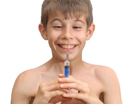 The boy and the syringe. Isolated on white backgroundの写真素材