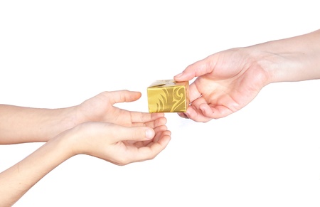 Hand with gift box. Isolated on white backgroundの写真素材