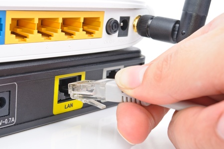 Connect the cable to the network switch. Close-up Photosの写真素材