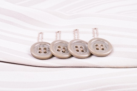 Buttons on the sleeve of jacket. Close-up Photos 