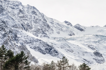Snow-covered mountains. Stock Photo of mountain scenery