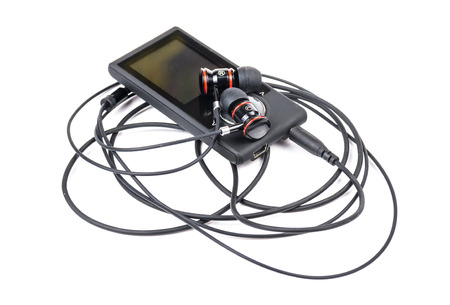 Audio player with headphones. For microstock photo on white background
