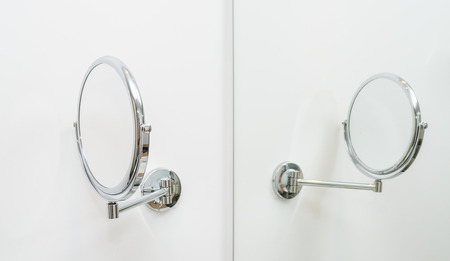 Round mirror in the bathroom. Photo for microstockの写真素材