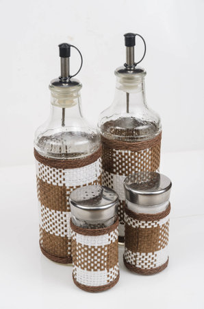 Vessels for spices in the kitchen. Microstock photography for over a white backgroundの写真素材