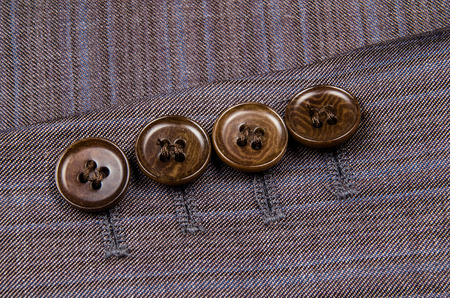 Buttons sleeve of his jacket. Macro photo for microstock