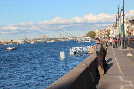 Fishing man in city . Saints-Petersburgのeditorial素材