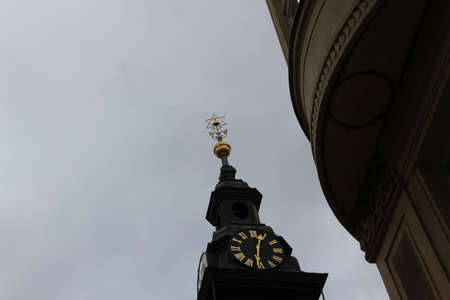 The clock tower of the Church of St. Nicholas in Krakow, Polandの写真素材