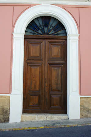 Wooden door in a mediterranean houseの写真素材