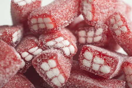 brick jellies on a white wooden tableの写真素材