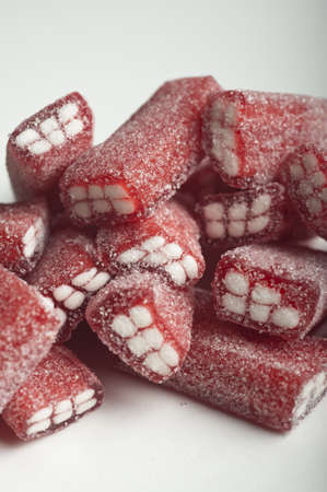 brick jellies on a white wooden tableの写真素材
