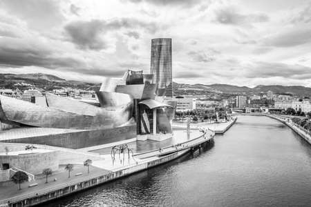 BILBAO, SPAIN - OCTOBER 1  Exterior of The Guggenheim Museum and Iberdrola Tower on October 1, 2013 in Bilbao, Spain  The Guggenheim is a museum of modern and contemporary art designed by Canadian-American architect Frank Gehryのeditorial素材