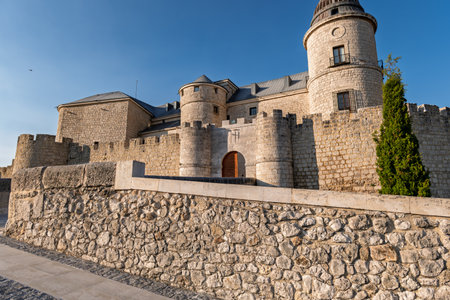 Simancas, Spain 31 july 2025  â Exterior view of the historic General Archive building with stone walls and towers under a clear sky.の写真素材