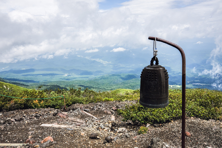 bell contemplating the view from summitの写真素材