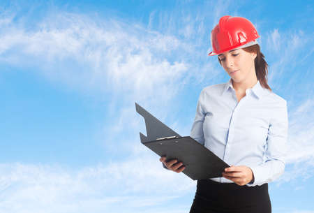 Business woman over clouds background. Paying attention to her folder