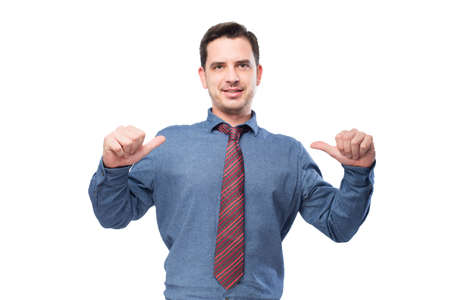 Man wearing a blue shirt and red tie. He is pointing to himselfの写真素材