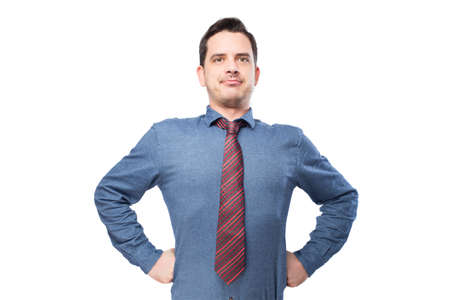 Man wearing a blue shirt and red tie. He looks confidentの写真素材