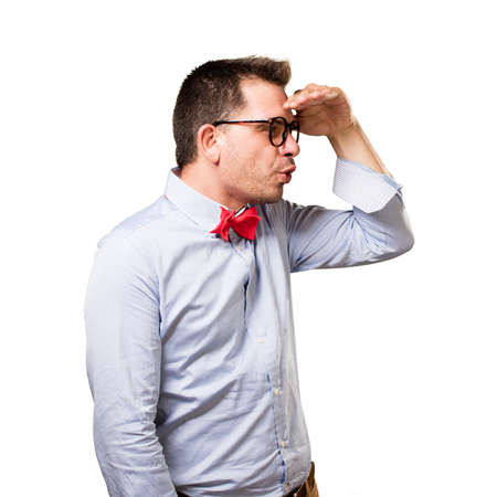 Man wearing a red bow tie. Looking surprised.の写真素材