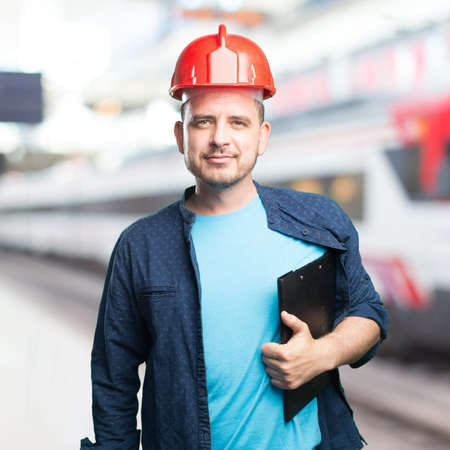 Young man wearing a blue outfit. Wearing red helmet.の写真素材